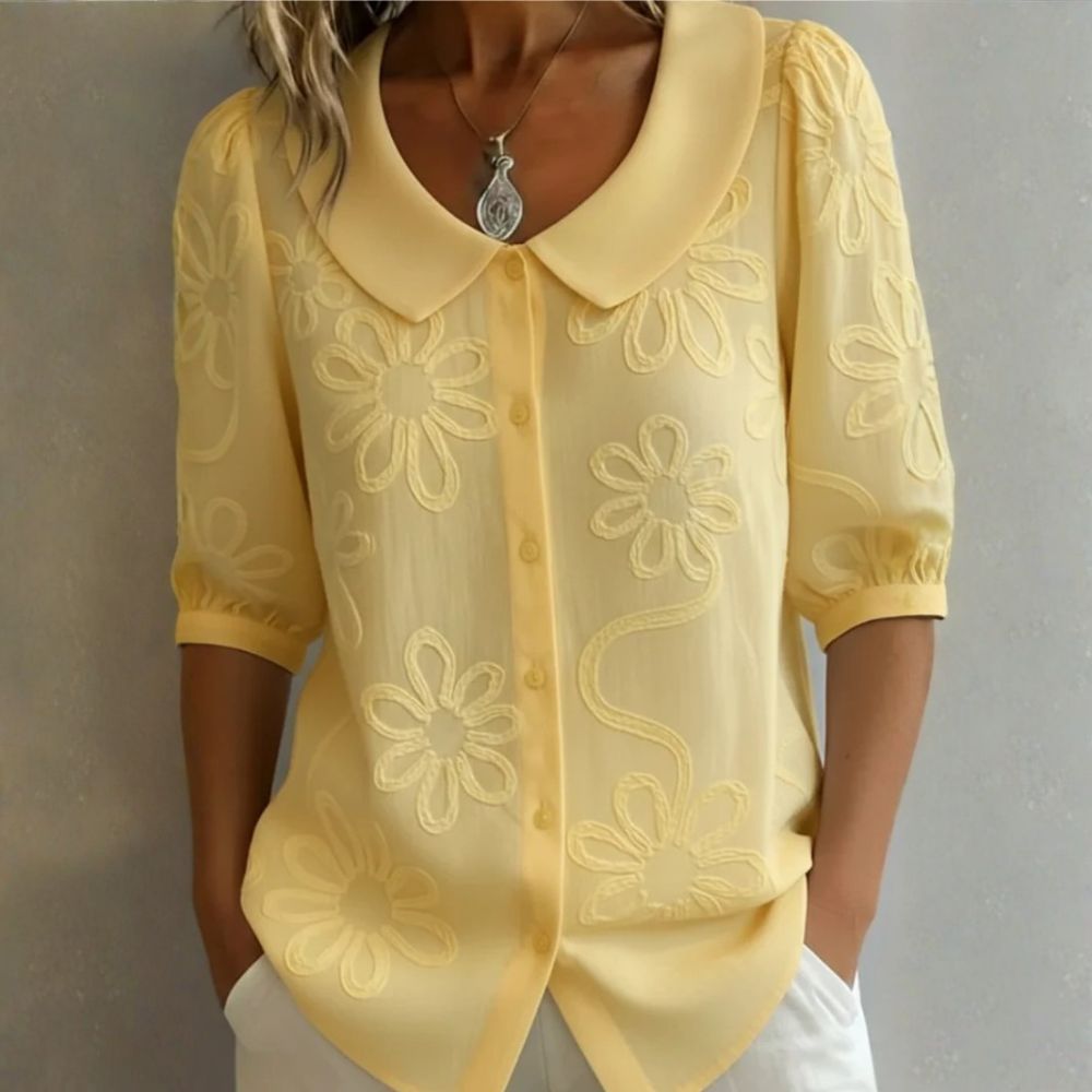 Régine - Blouse élégante à détails floraux