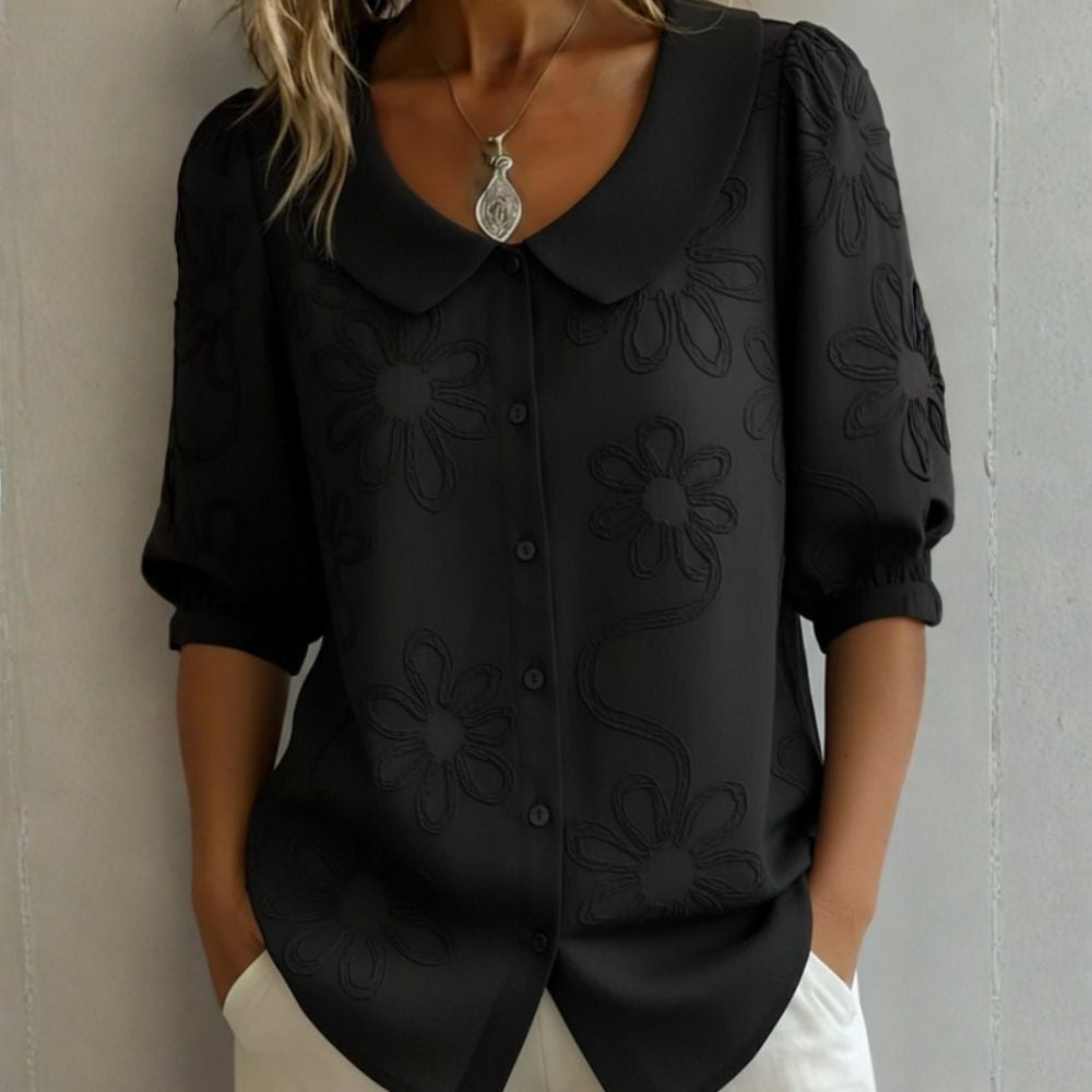 Régine - Blouse élégante à détails floraux