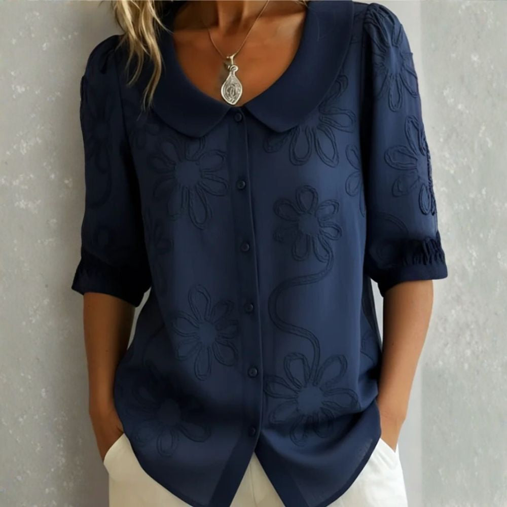 Régine - Blouse élégante à détails floraux
